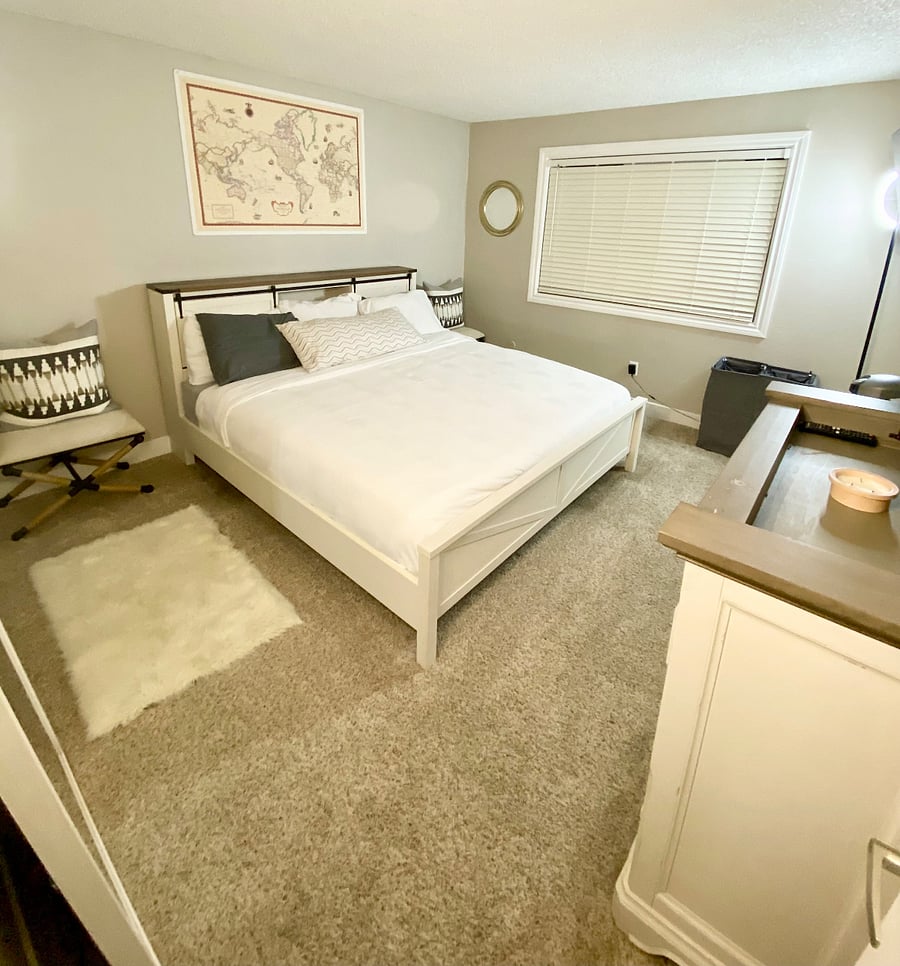 King size bed with memory foam mattress and a 50in smart tv