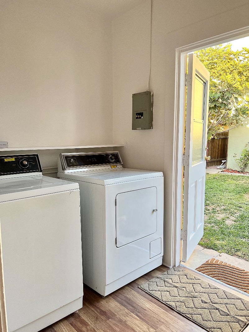 Washer and dryer located in utility room. 