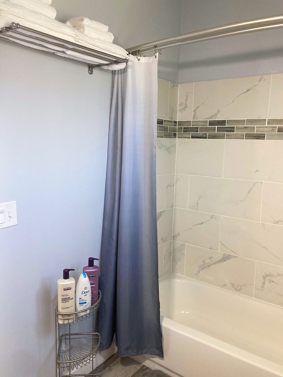 Full bathroom with bathtub