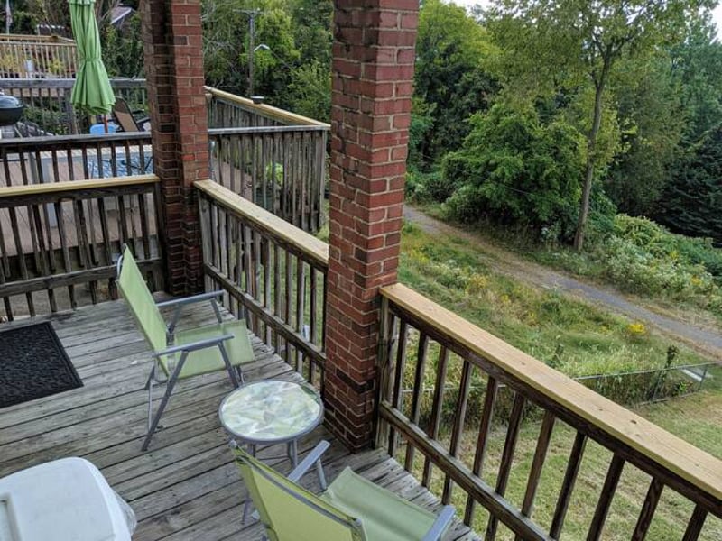 The deck has been updated and a new, large, lower deck has been added since this photo. Keep scrolling for new pics...