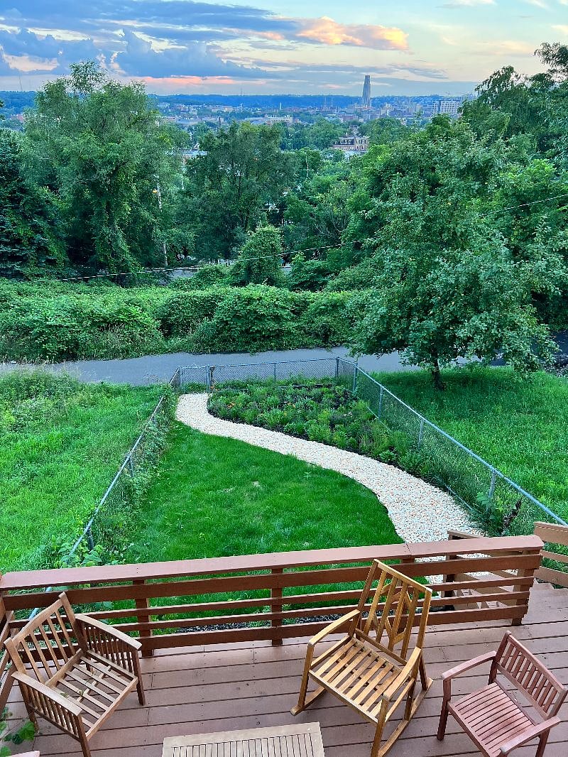 Thoughtful, native landscaping (new as of 2023) makes for a scenic garden full of butterflies and local wildflowers. No maintenance required!