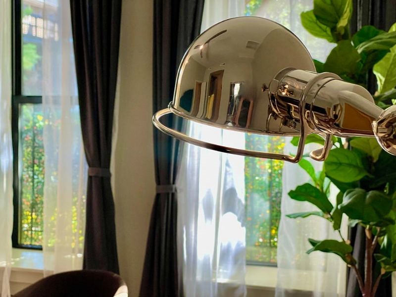The Jean-Louis Domecq "Jield" metal floor lamp is the star of the show in the living room.
