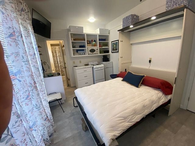 The Murphy bed is equipped with L.E.D. lighting for convenient readying!