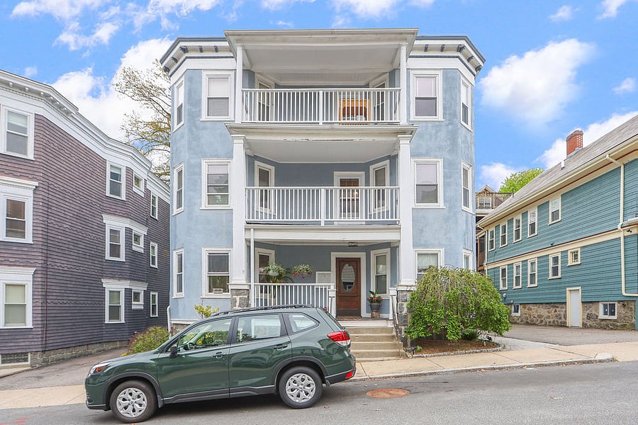 Building exterior - unit is on second / middle level