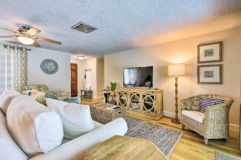 Relax in front of the 48" TV containing basic cable and Blue Ray player.
