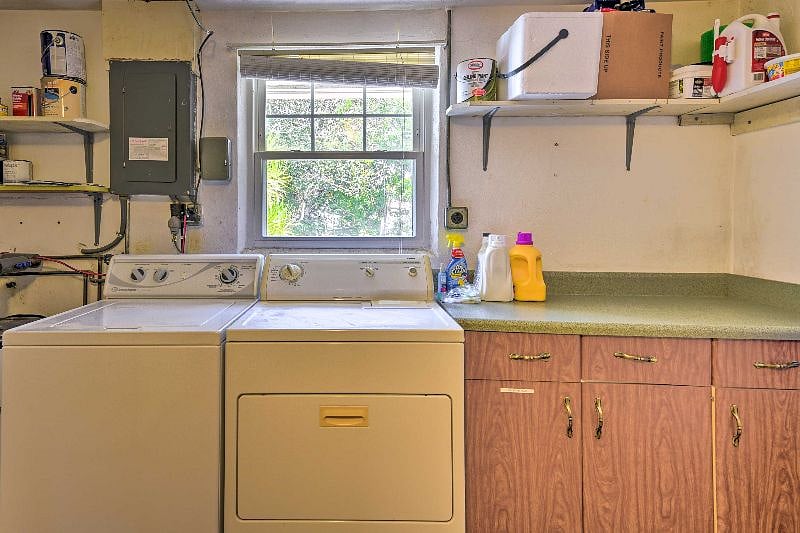 Single-car attached garage with washer and dryer.