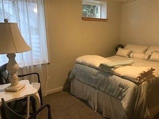 New queen size bed, sheets and pillows.