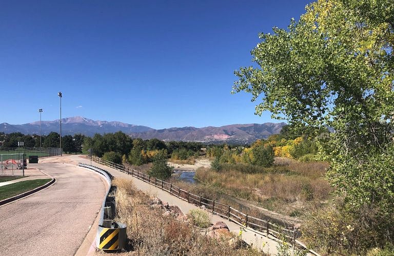 View of the start of Cottonwood Creek park and pikes peak. (About a 20 minute trail walk from the house).