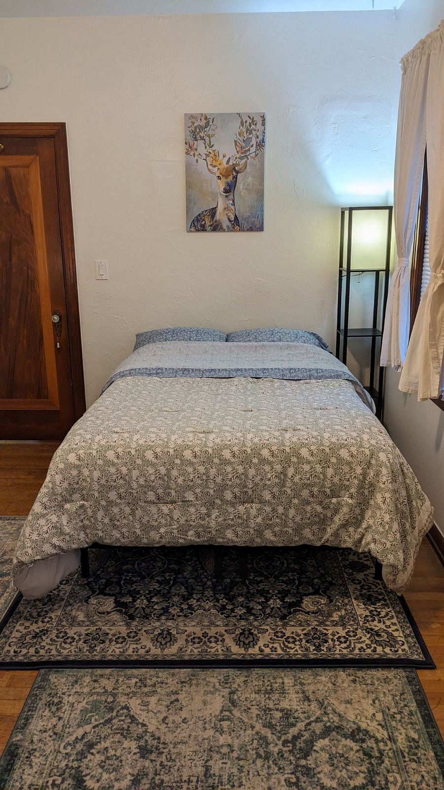 Private bedroom with Full bed, desk, and double closet.