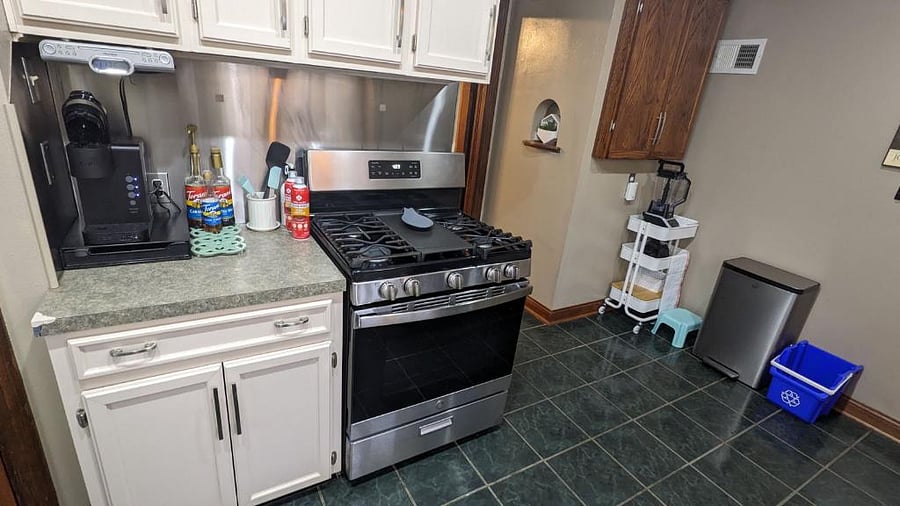 Kitchen (shared with basement tenants) with dishwasher, gas range stove/oven, full size refrigerator/freezer, tea and coffee stations, air fryer, blender, toaster, etc.