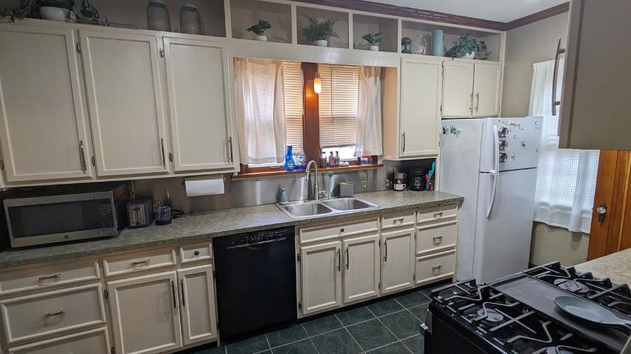 Kitchen (shared with basement tenants) with dishwasher, gas range stove/oven, full size refrigerator/freezer, tea and coffee stations, air fryer, blender, toaster, etc.