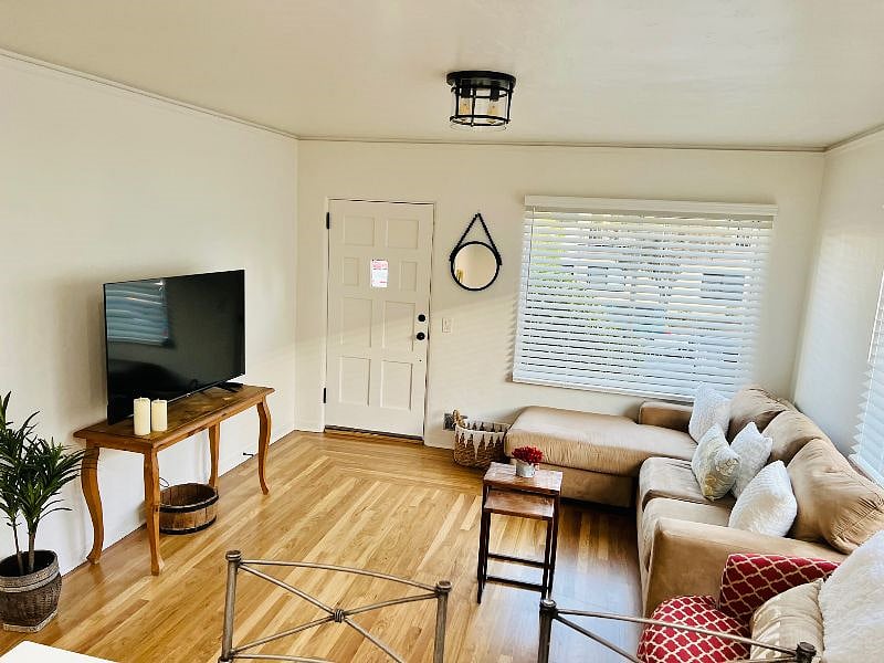 Curl up on the cozy couch with chaise and watch a movie or read a book