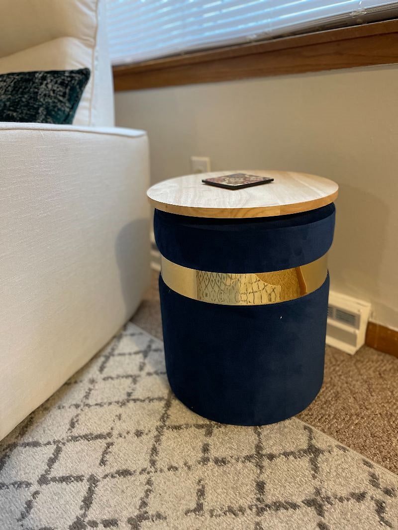 This beautiful piece has a dual purpose as an end table and extra seating when needed!