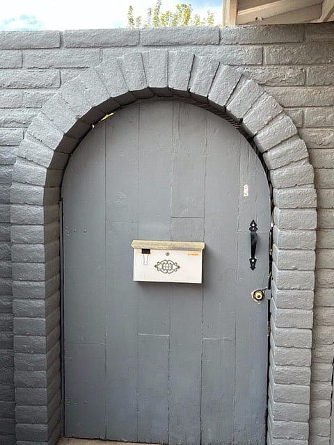 Separate entrance on left side of house.