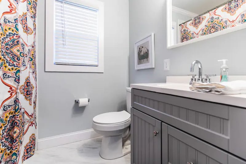 Full bathroom upstairs with tub/shower combination 