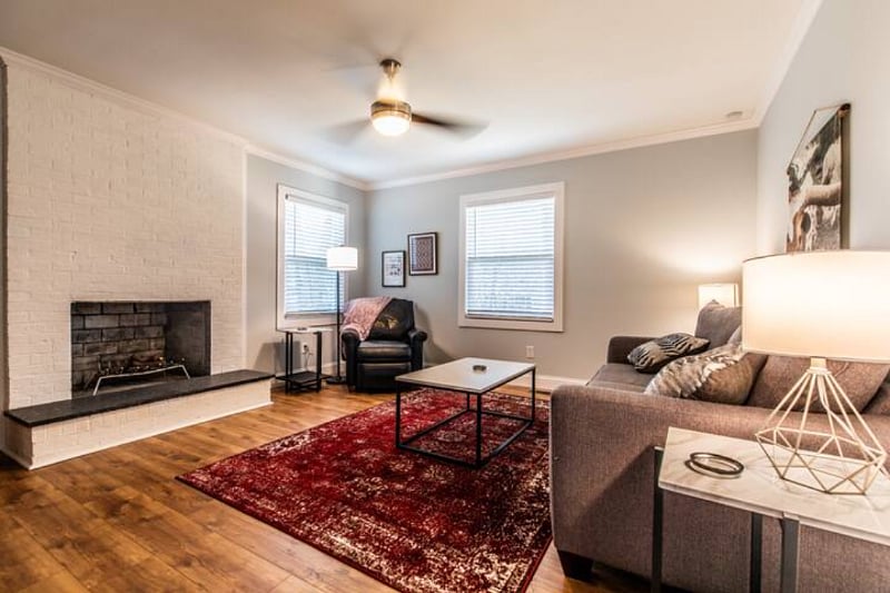 Den.  Couch pulls out into a queen sofa bed as the 5th bedroom with a door for privacy.  Includes a Smart TV.