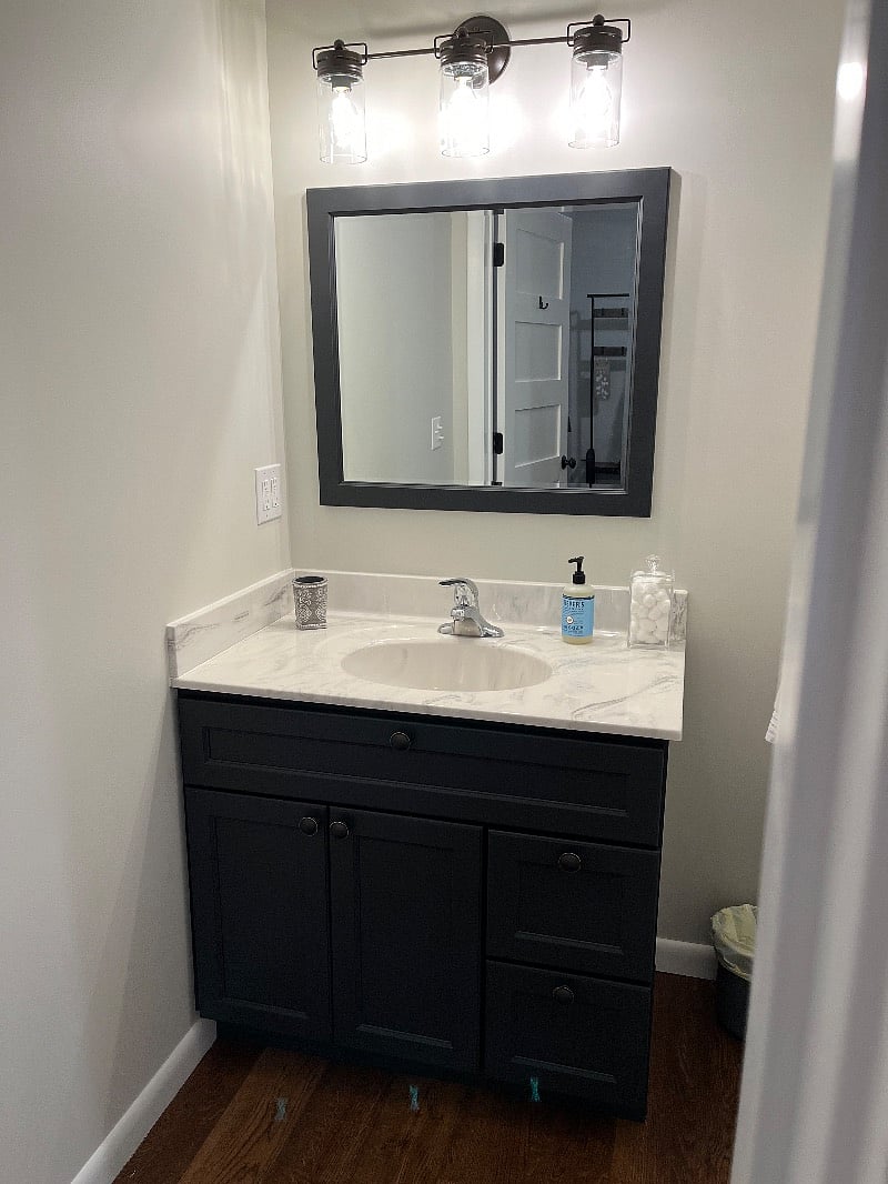 Fresh bathroom with new everything... shower/tub combo, cabinetry, toilet, towels, oh my!
