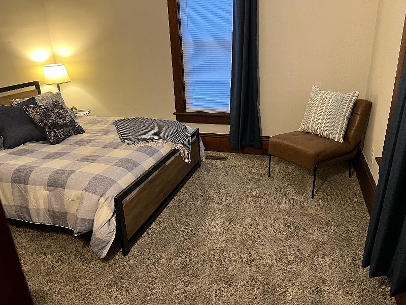 Serene bedroom with blackout curtains... catch some ZZZ's