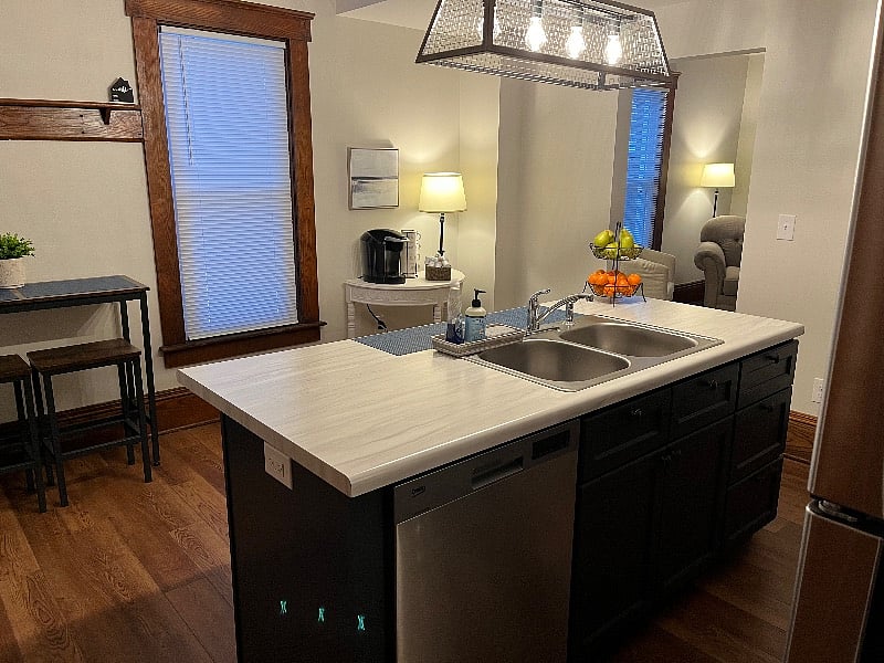 Beautiful kitchen with range, refrigerator, dishwasher, microwave, coffee station, eat-in spots and much more!