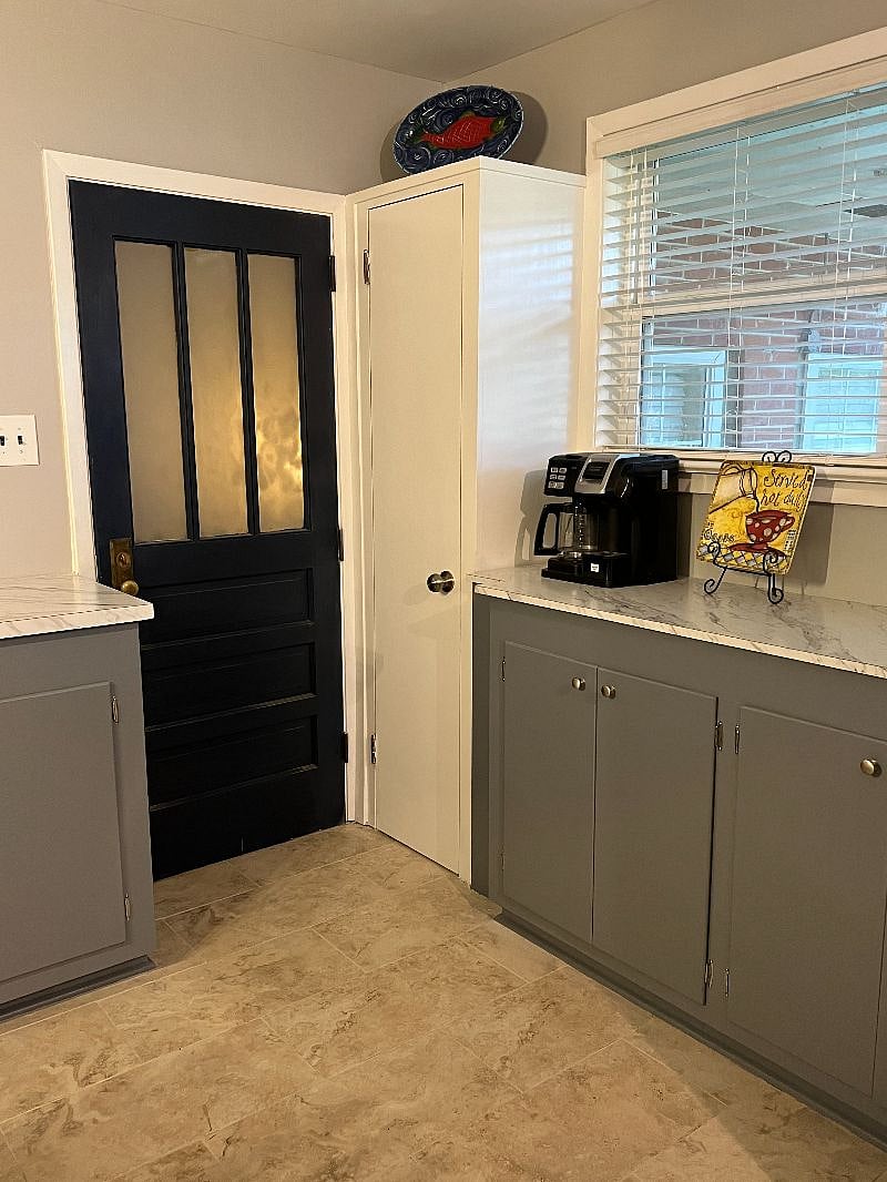 Coffe Bar with pantry Closet to the left and door to the Sunroom