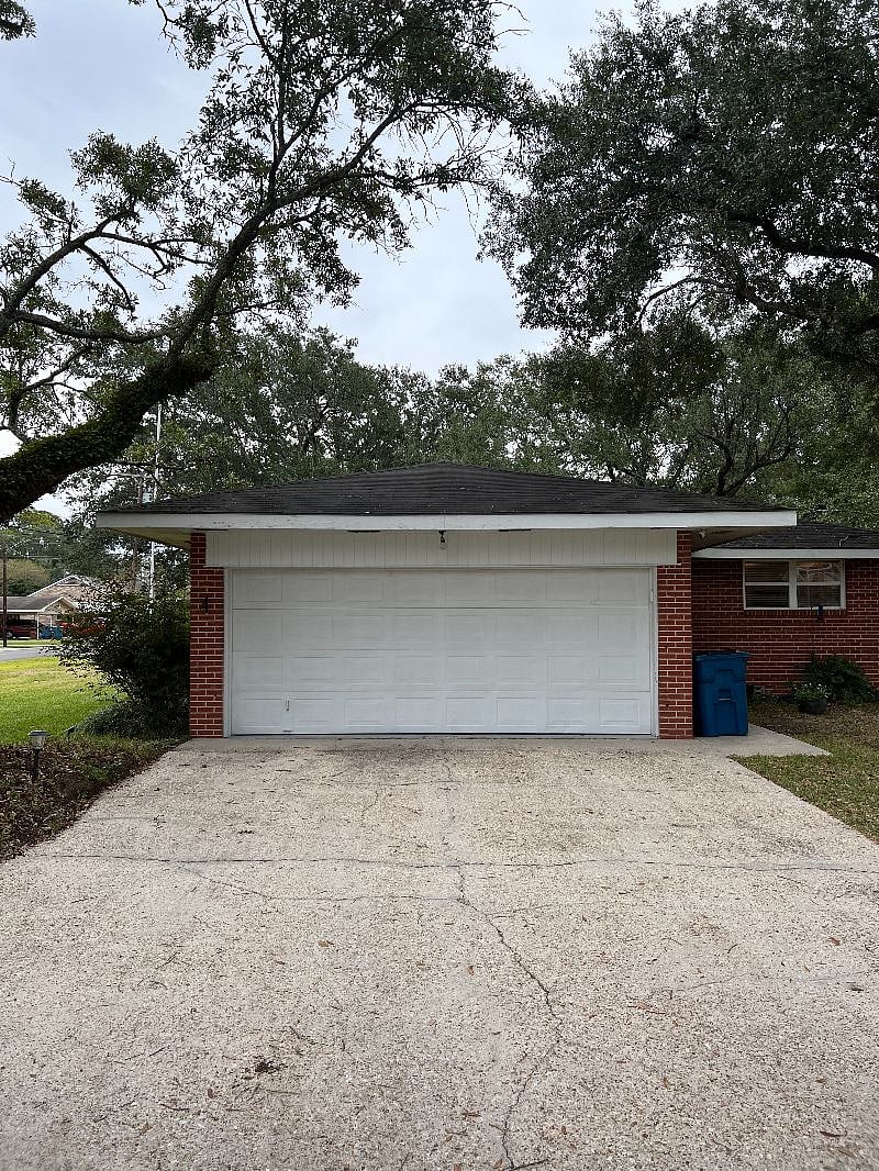 Driveway and Garage is on the side of the House - Main Entre