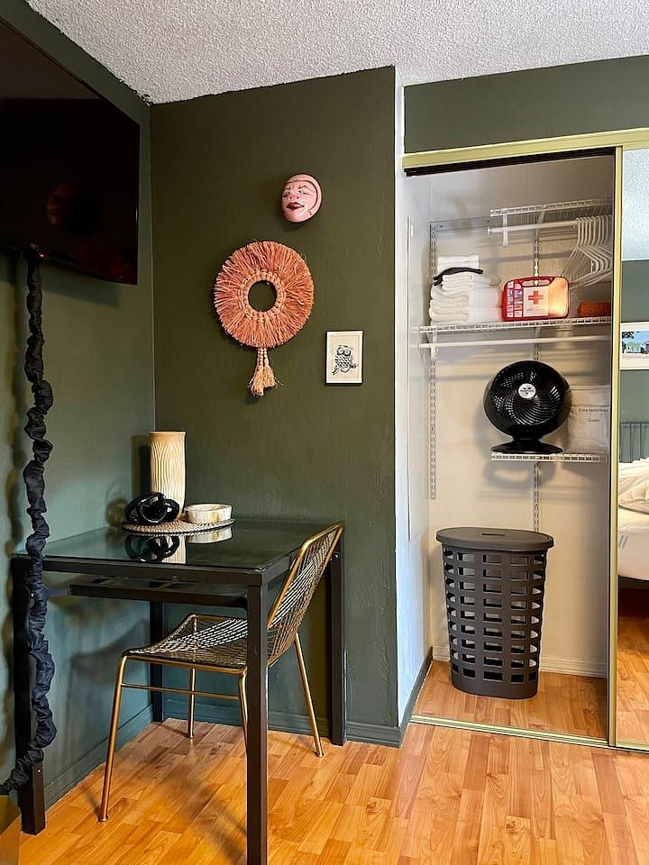 Your closet along one side of the room features customisable rails and shelves. From organising small accessories to storing large suitcases, find your perfect storage solution. (Just like home!)