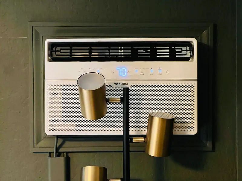 Wall-mounted A/C at a purposely designed height and a 4-setting bedside lamp to control the mood or function of the rooms lighting