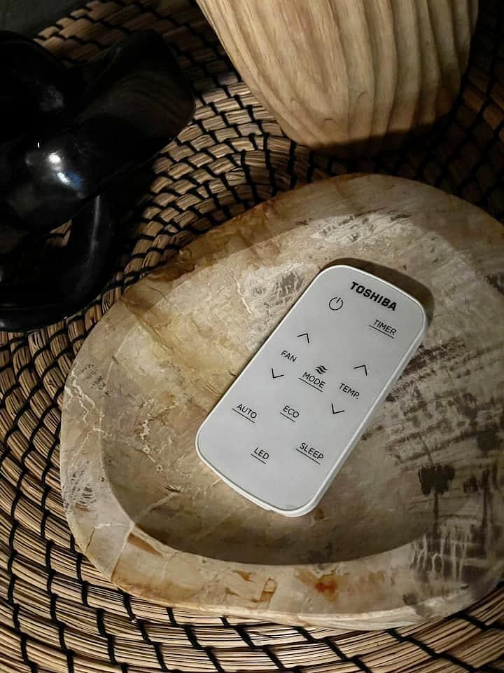 Small conveniences such as remotes to control the air-conditioner from your desk.