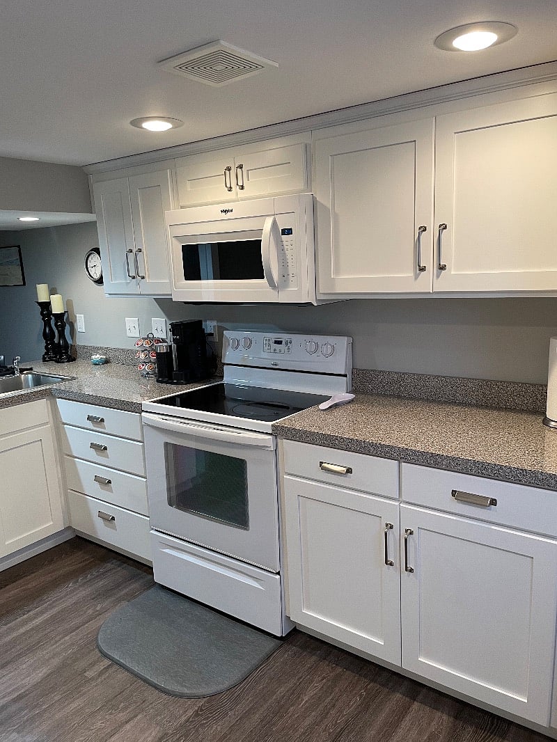 Kitchen with full size refrigerator, stove, dishwasher, and microwave