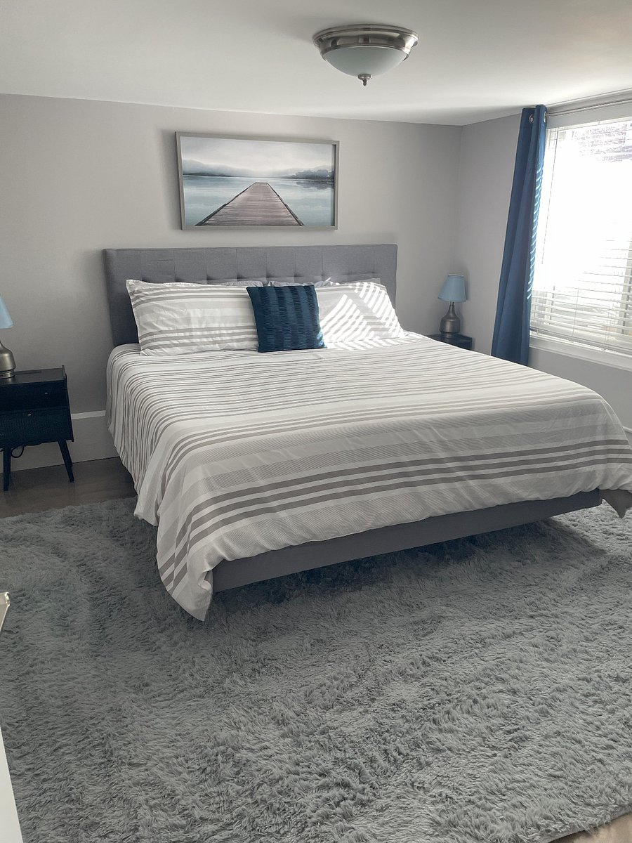 King Size Bed. Full size window with blackout curtains