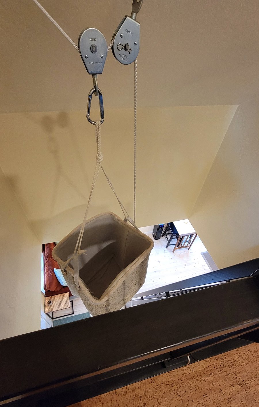 Your inner child will love this clever laundry basket pulley system.