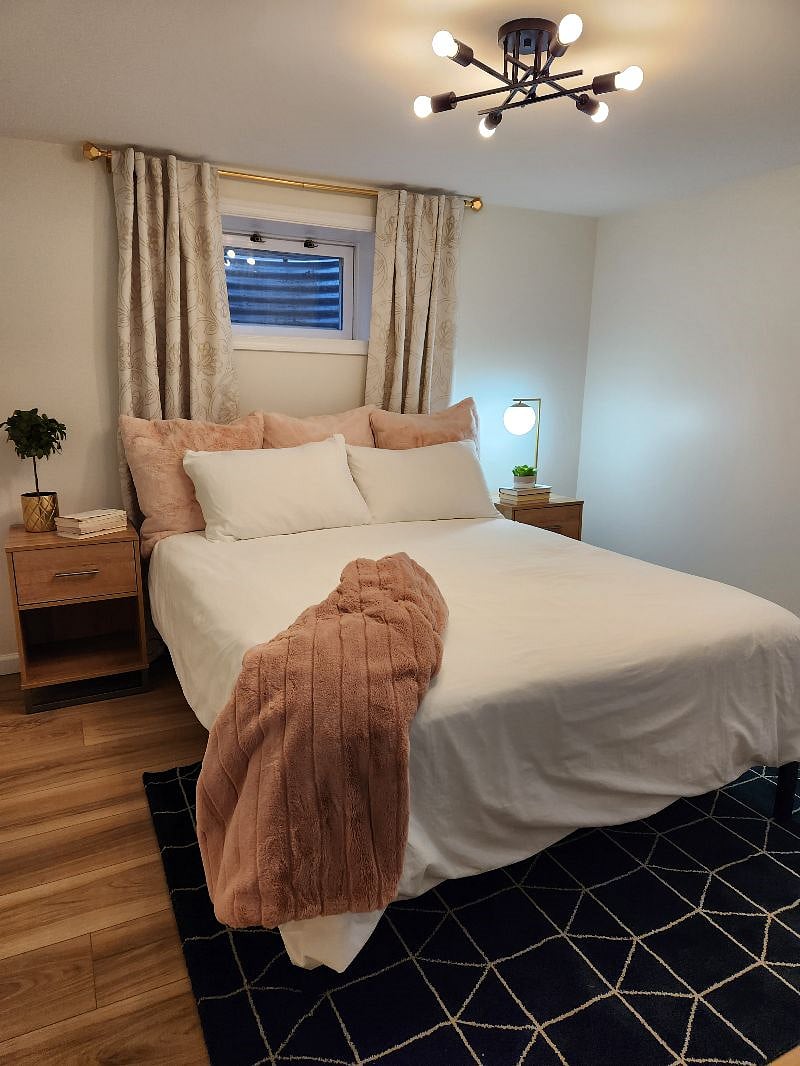 Queen bed. Blackout curtains.
