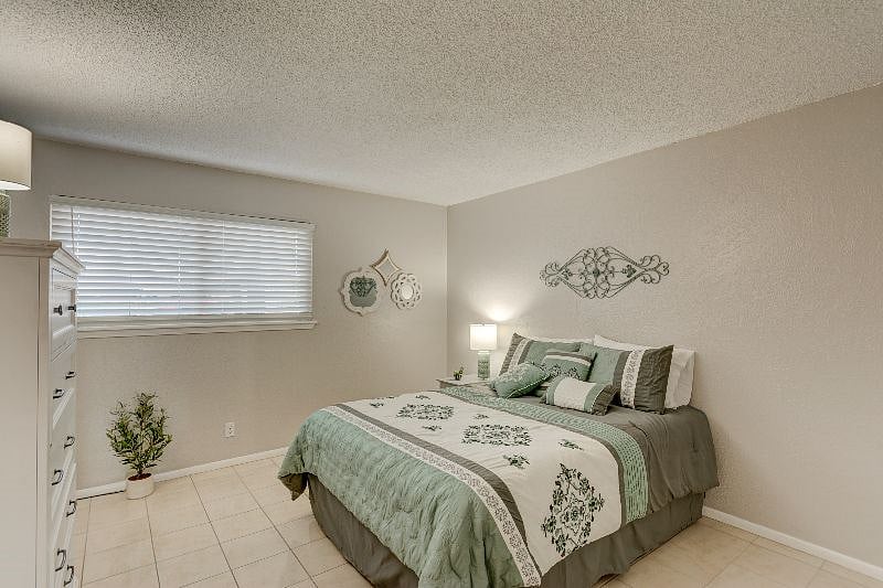 2nd bedroom has a queen size bed and a large closet