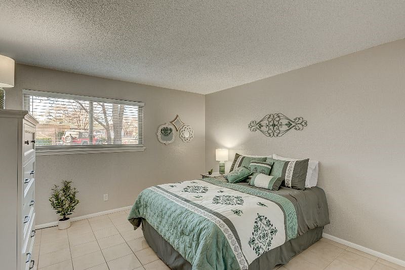 2nd bedroom with queen size bed and have added black out curtains!