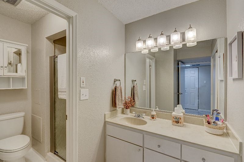 This is the Primary bathroom with a large closet  and has a shower