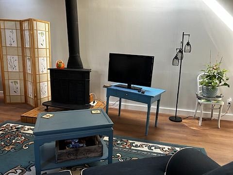TV sitting area, wood stove not the main source of heat