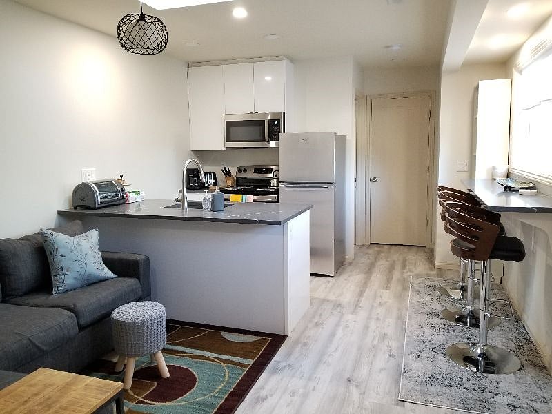 Skylight in the kitchen/living space, windows throughout, and open floor plan living