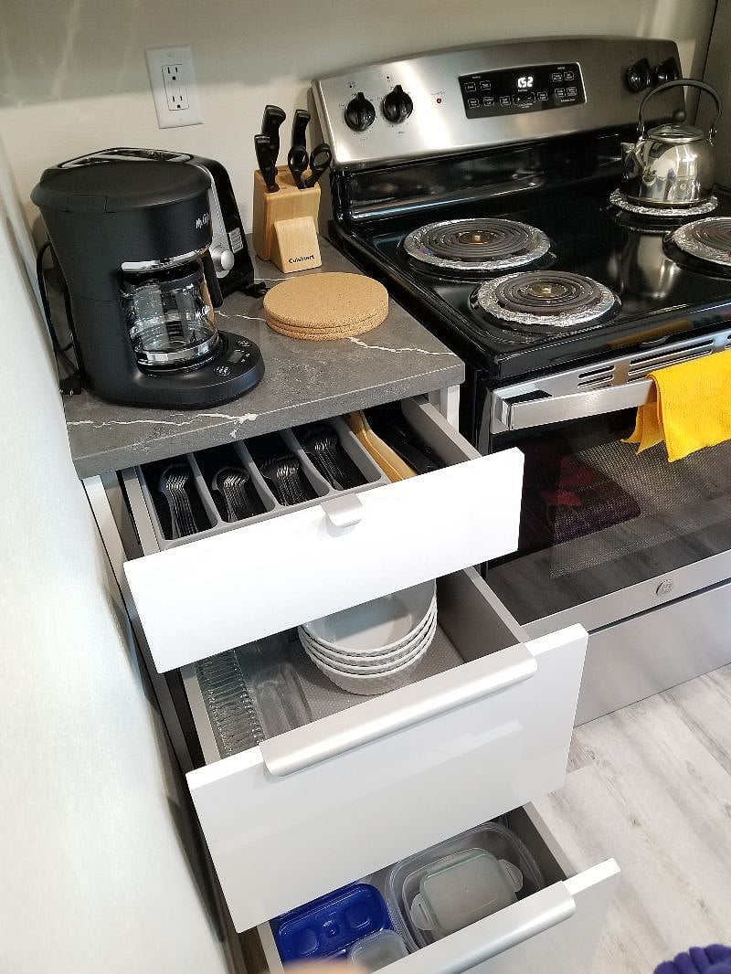 Brand new small appliances (coffee maker, toaster, oven) and Kitchen essentials