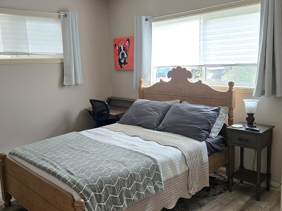 Each bedroom includes a private bathroom (with new sink vanities, toilets, and showers), 58" flat screen Smart TV, and a desk and office chair.