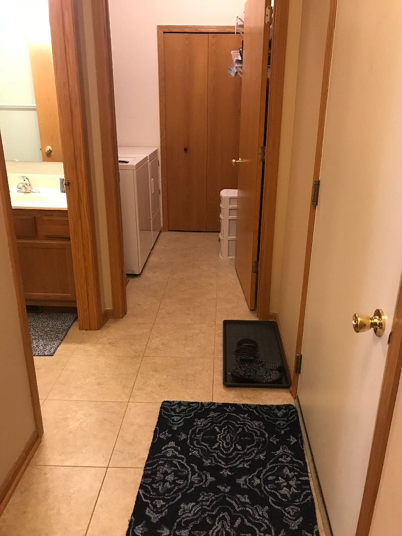 Your bathroom to the left, laundry room straight ahead, garage entrance to the right