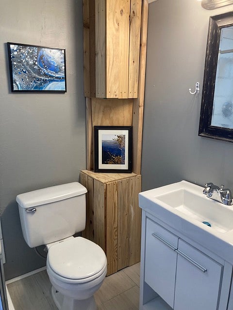 Bathroom, we just updated w/new vanity, mirror, and tile floor. Ba