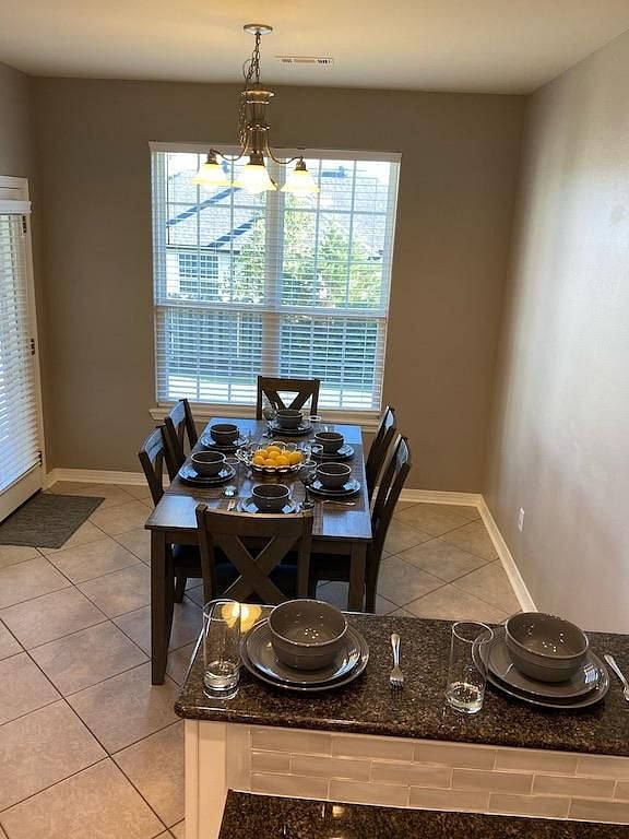 Dining area also has bar top with seating for two