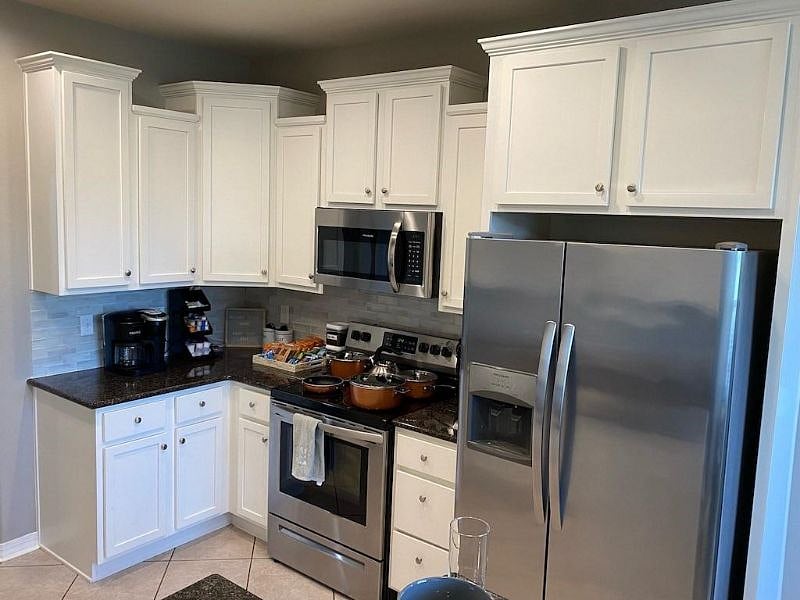 Kitchen is fully stocked with pots, pans, dishes and all needed cooking utensils. Too much to list.