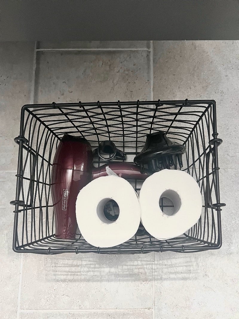 hair dryer with diffuser and nozzle; extra toilet paper 