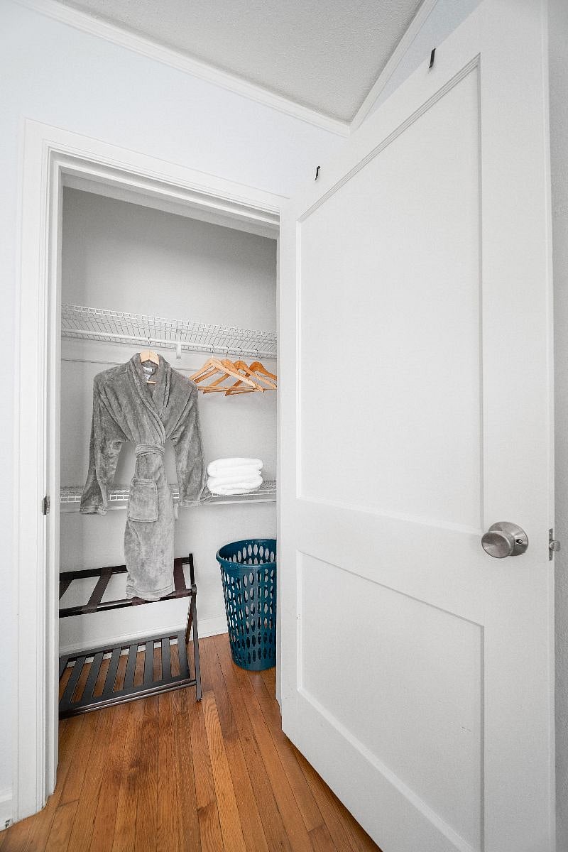 Both rooms have closets, hangers and luggage racks.