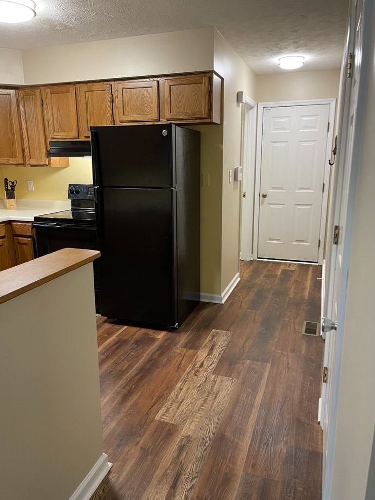 Kitchen with access to game room in garage