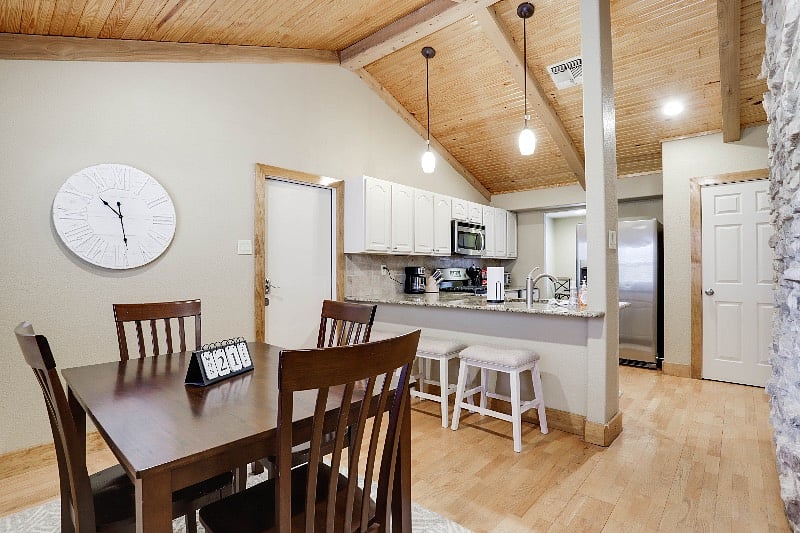 Full Kitchen | Includes gas stove + range and comfortable seating for seven.