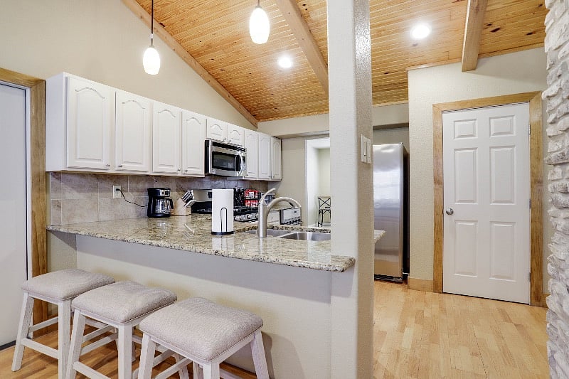 Full Kitchen | Make cooking meals for your stay a breeze with included pots, pans, crock-pot, knife set, toaster/convection oven, cooking sheets, and seasonings/spices.