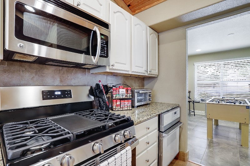 Full Kitchen | Make cooking meals for your stay a breeze with included pots, pans, crock-pot, knife set, toaster/convection oven, cooking sheets, and seasonings/spices.