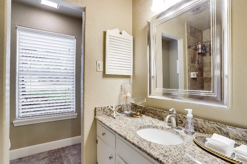 Full Bathroom #2 | Serves the two queen bedrooms with shower/tub combination.